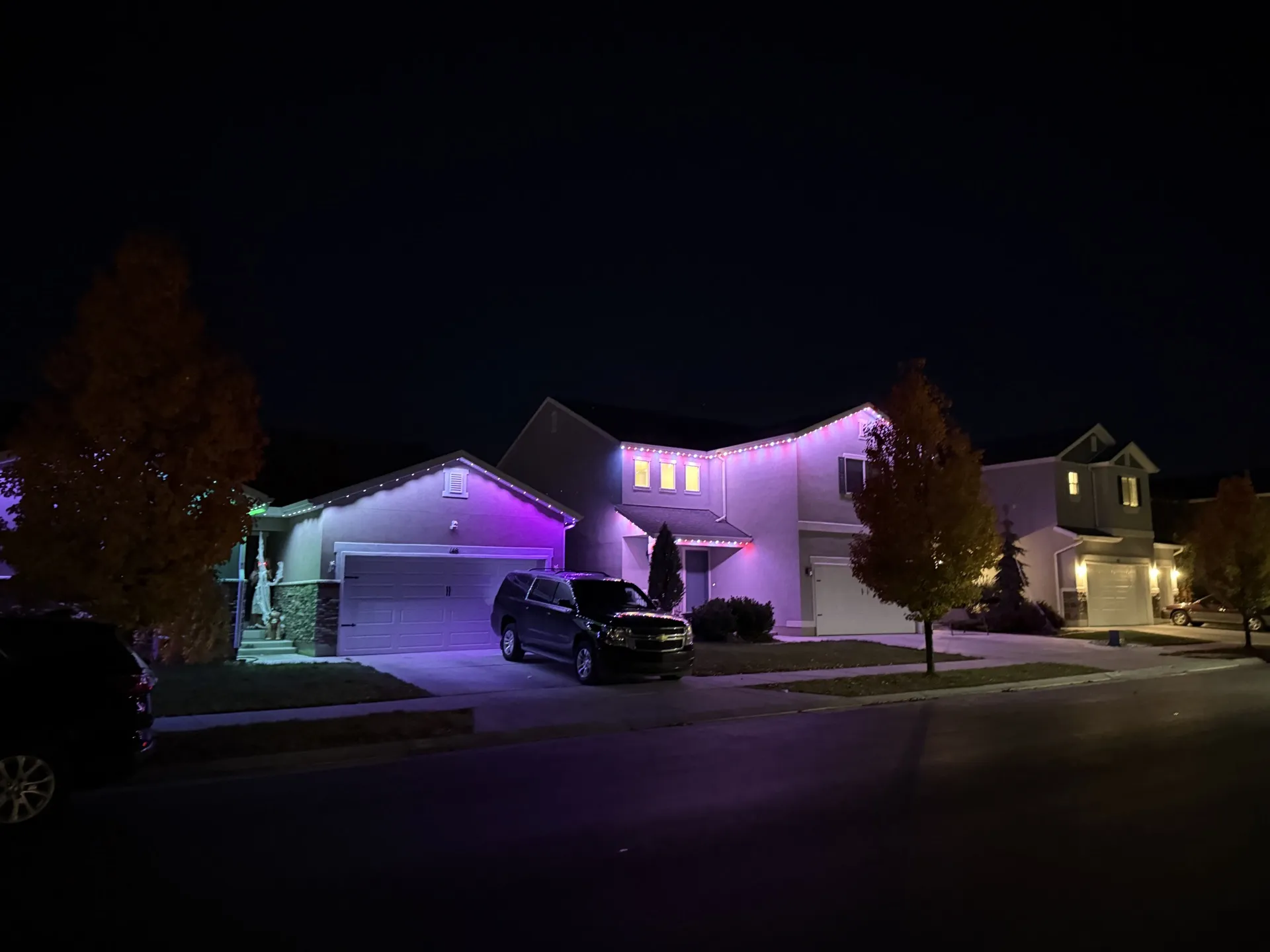 Large Utah home with warm white permanent LED lighting installation